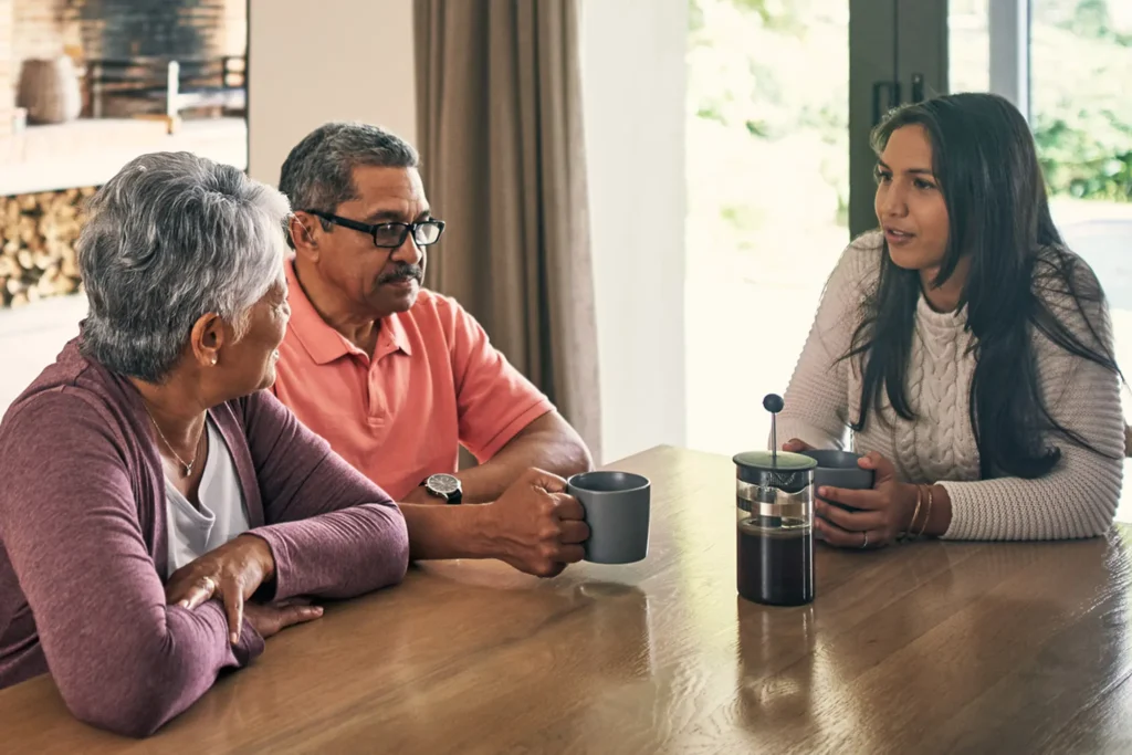 Family discussing legacy to pass on values, not just assets