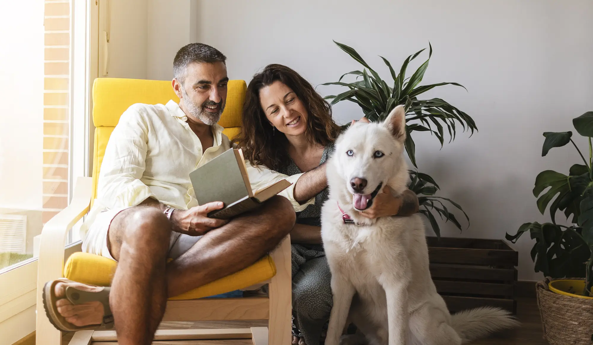 Couple making sure their pets are taken care of when they are gone