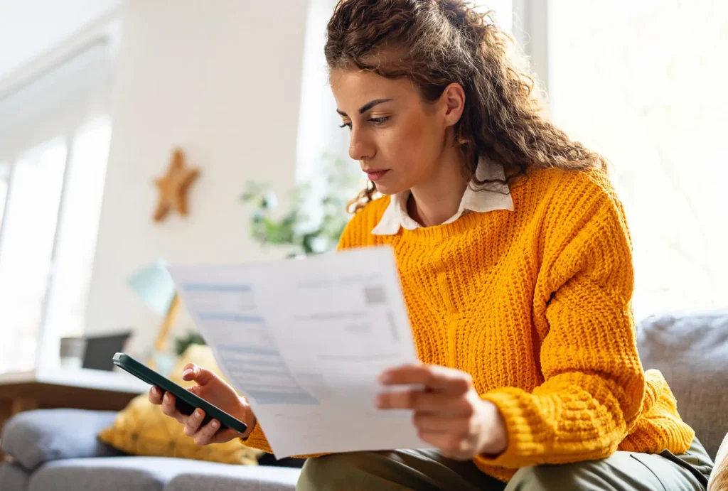 Person reviewing their midyear tax checkup