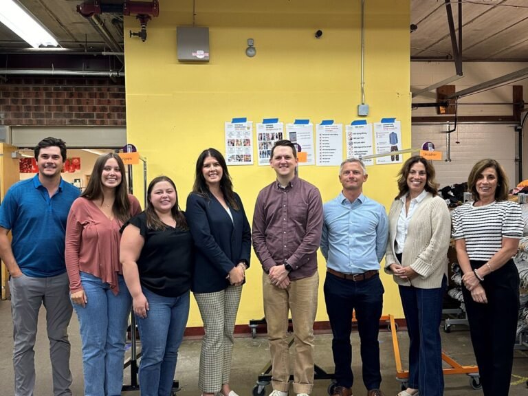 Minneapolis team volunteering at the Resale Select store with Interfaith Outreach & Community Partners