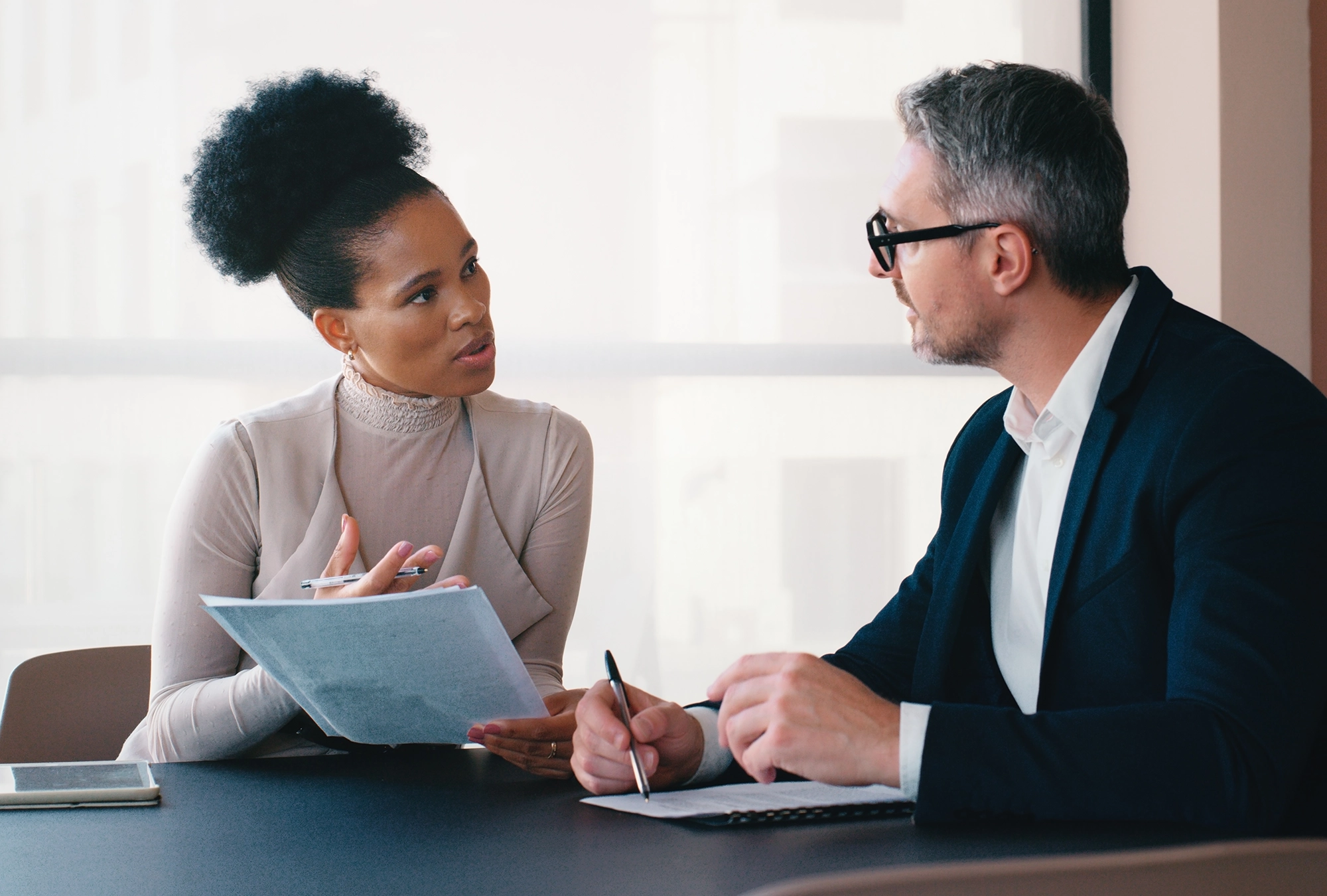 woman talking with an investment advisor