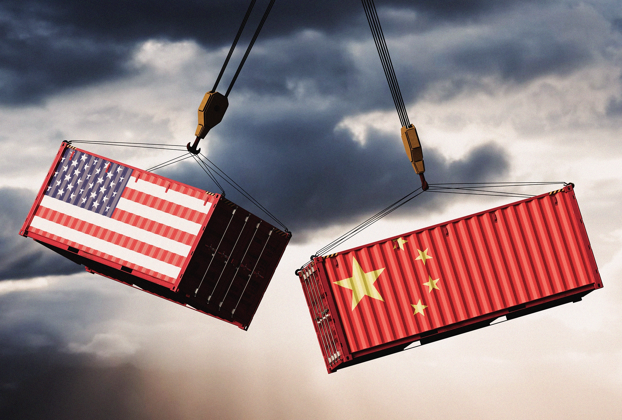 image of two shipping containers hanging in the air, one with American flag and one with China flag