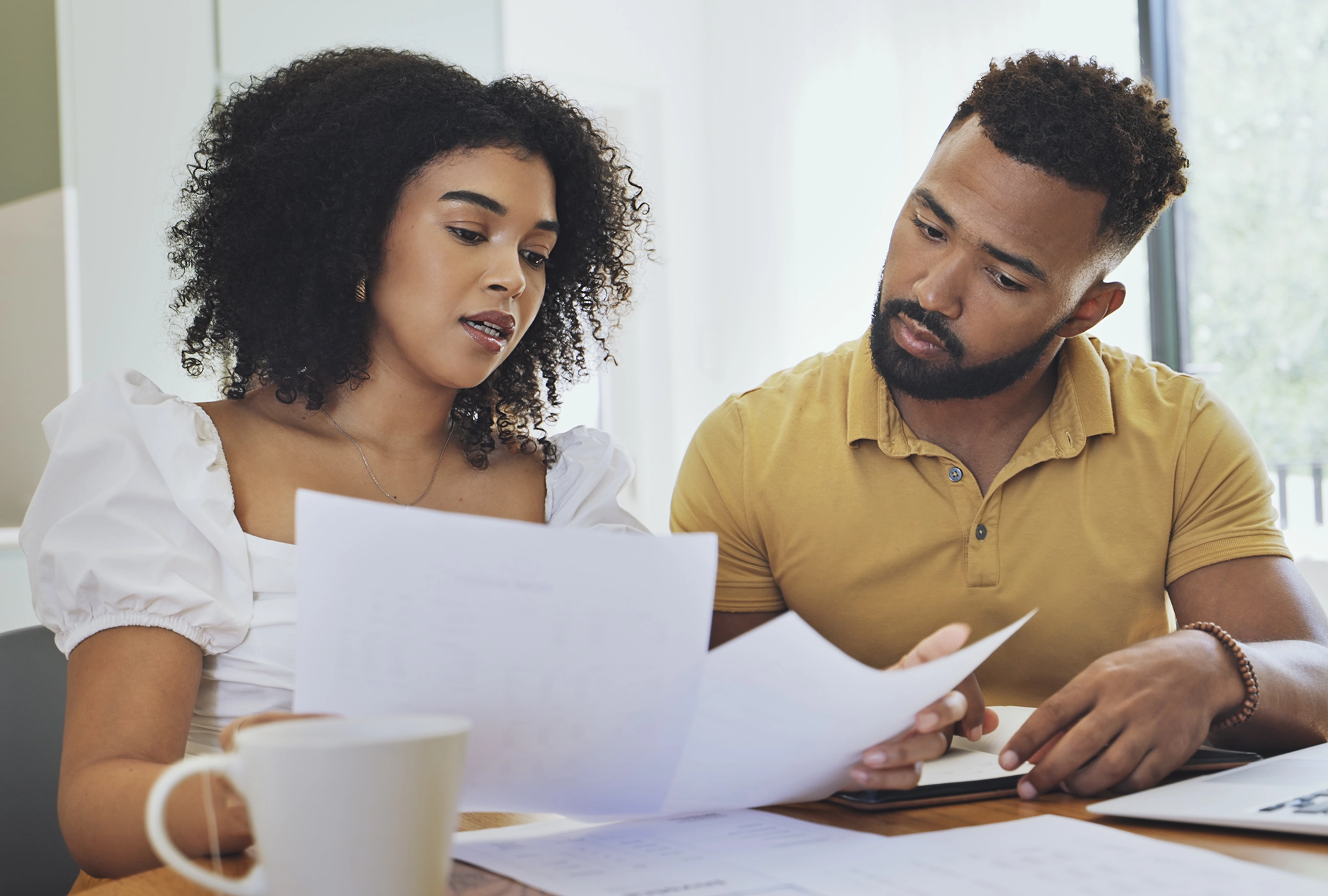 husband and wife going over their financials